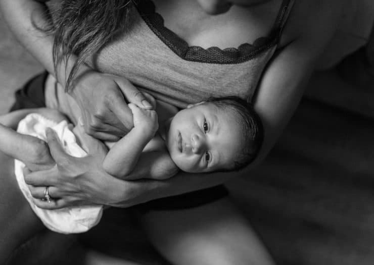 A newborn baby, black and white